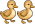Two duckling are walking.